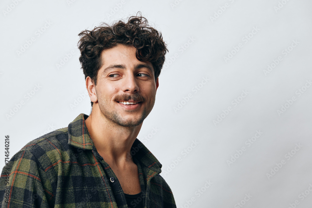 Obraz premium Man one face shirt hipster look smile portrait copyspace trendy fashion beard beautiful handsome