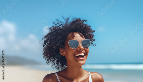 Portrait of a young black African woman in white on the beach