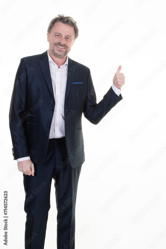 Portrait man middle aged of cheerful businessman pointing at copy space side empty for advertising against white background Portrait man middle aged of cheerful businessman pointing at copy space side empty for advertising against white background