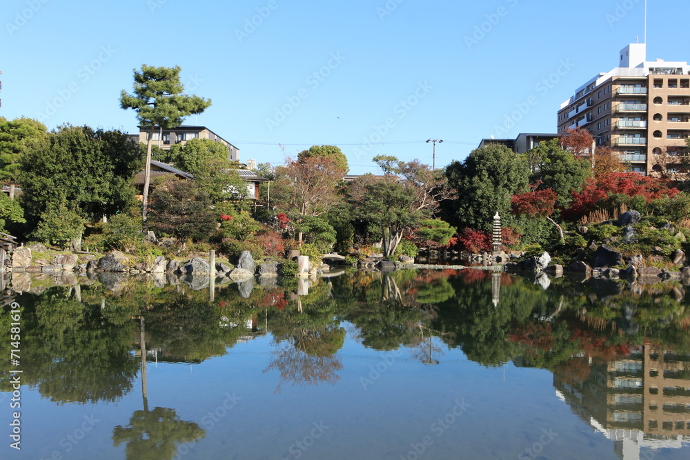 Ingetsu Pond and autumn leaves in Shosei-en Garden, Kyoto, Japan