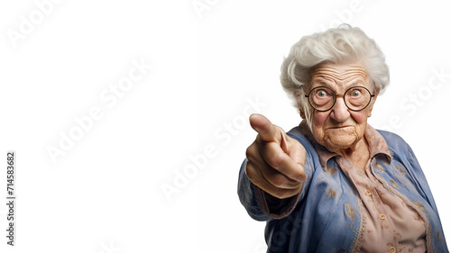 An Elderly Woman Pointing Her Finger Scolding Someone on a White Background With Copy Space photo