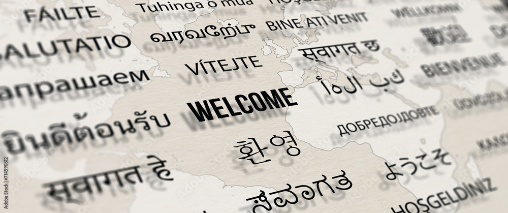 Welcome in different language on paper with world map background. Depth of field image. Words cloud concept.