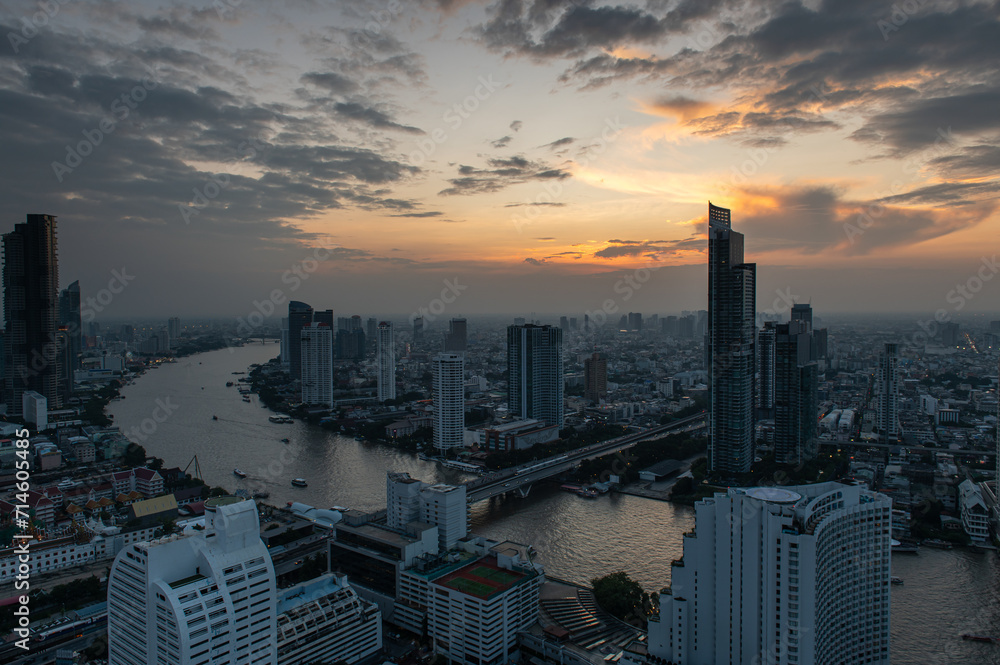 Scenic view curved of the Chao Phraya River in Bangkok city downtown at sunset, capital of Thailand