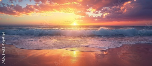 Stunning sunset beach scene with serene waves and captivating sky, perfect for meditation wallpaper.
