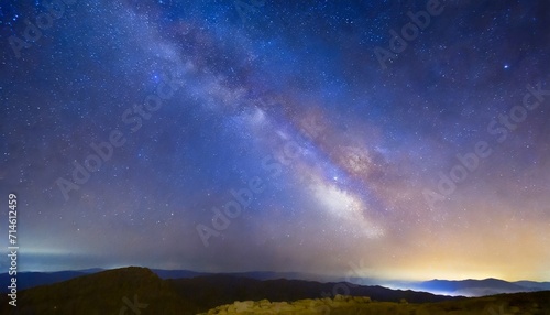 starry night sky and milky way galaxy with stars and space dust in the universe