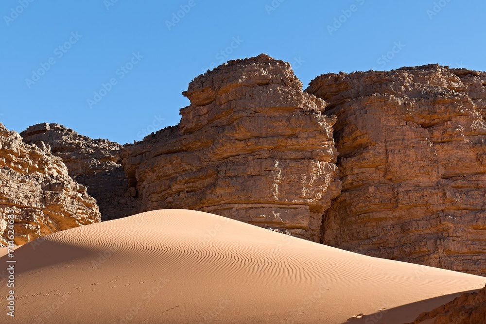 Oued Taghine rock formations in the tourist area of Immourouden, near the town of Djanet. Tassili n Ajjer National Park. Sahara desert.  Algeria. Africa.