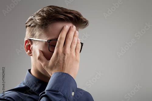 sudden remembrance brings a flush of shame, as the young man in photo