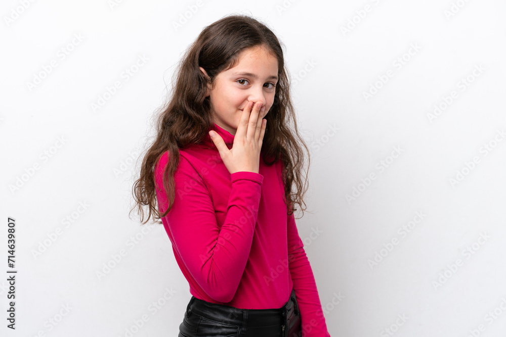 Little girl isolated on white background happy and smiling covering mouth with hand Little girl isolated on white background happy and smiling covering mouth with hand