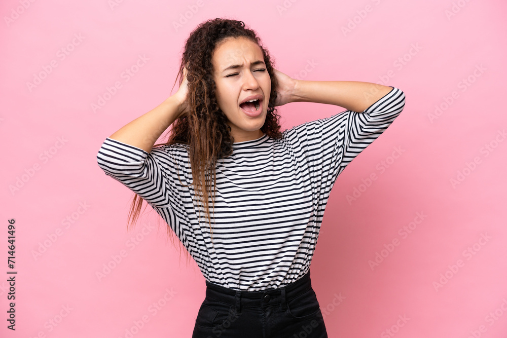 Young hispanic woman isolated on pink background stressed overwhelmed Young hispanic woman isolated on pink background stressed overwhelmed