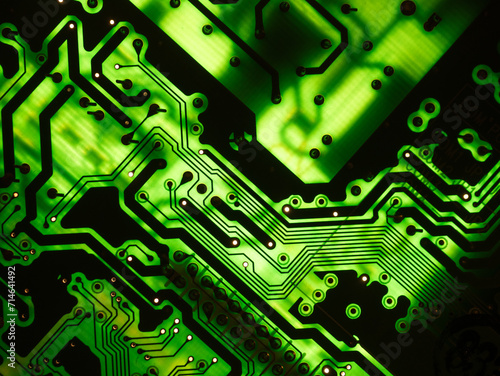 Computer green circuit board technology background. Macro closeup.