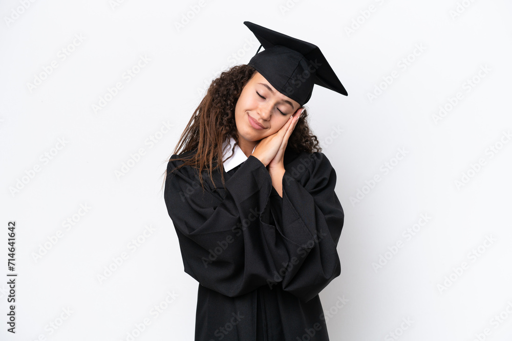 Young university graduate Arab woman isolated on white background making sleep gesture in dorable expression Young university graduate Arab woman isolated on white background making sleep gesture in dorable expression