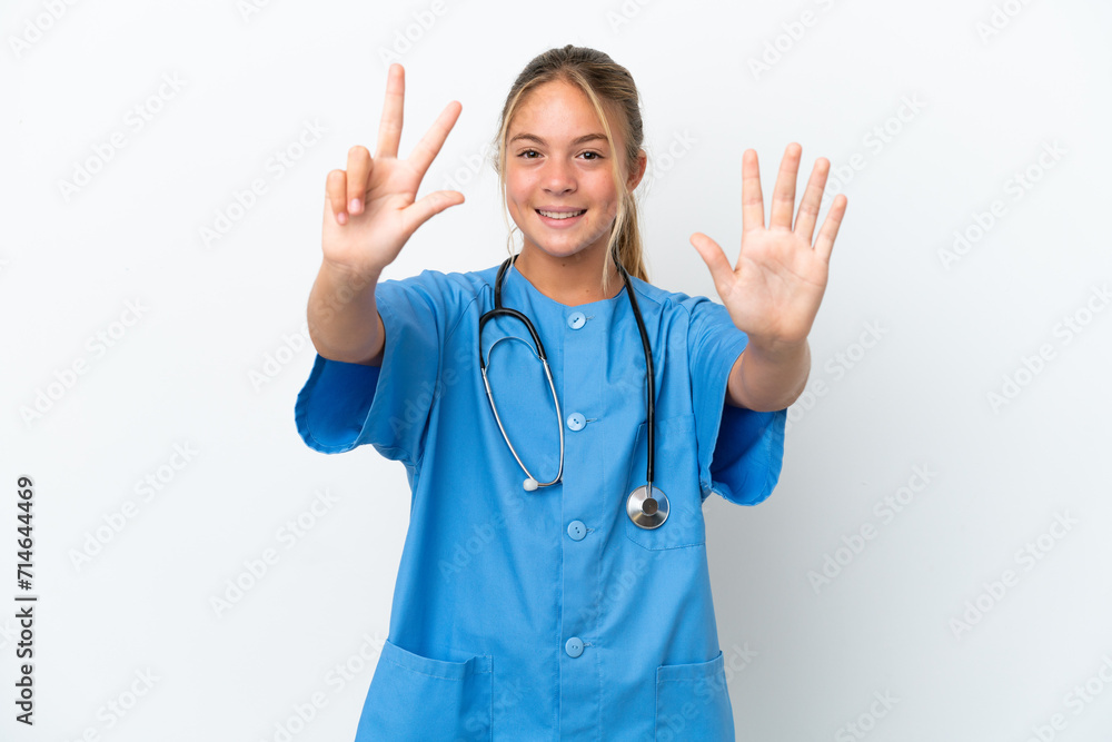 Little caucasian girl disguised as surgeon isolated on white background counting eight with fingers Little caucasian girl disguised as surgeon isolated on white background counting eight with fingers