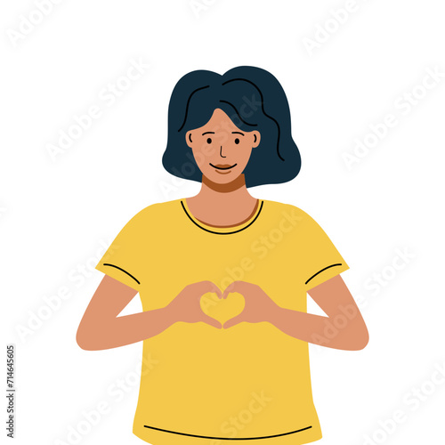 Female person is showing sign of heart with their hands. Inspire Inclusion is campaign theme of International Women's Day 2024. #InspireInclusion