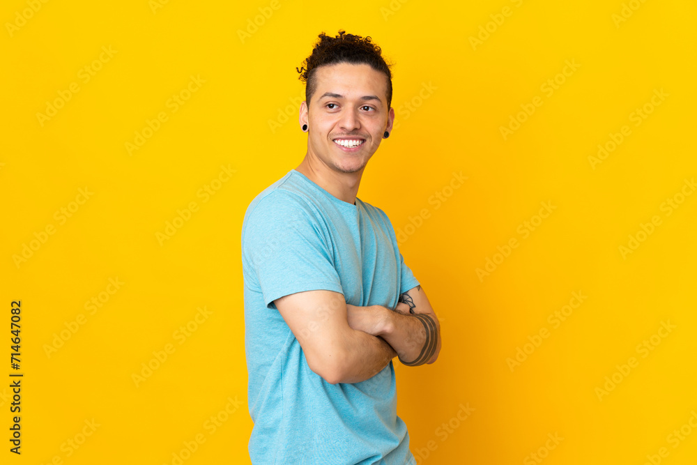 Caucasian man over isolated background looking to the side and smiling Caucasian man over isolated background looking to the side and smiling