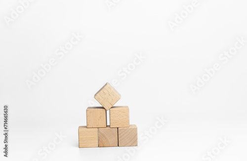 building wood blocks on white background  business or creative concept