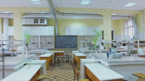 Chemical lab with desks and chalkboard in University 