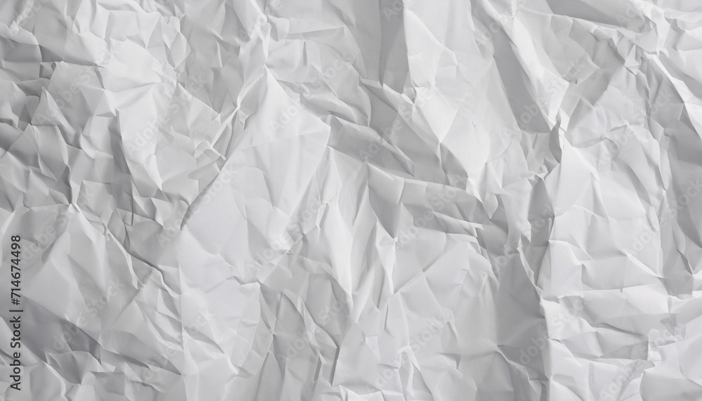 Obraz premium White patterned background of crumpled paper