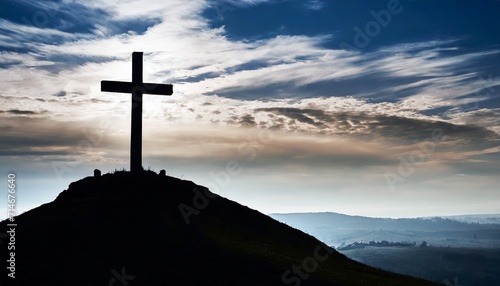 christianity depicted by silhouette of cross on calvary hill against sky backdrop