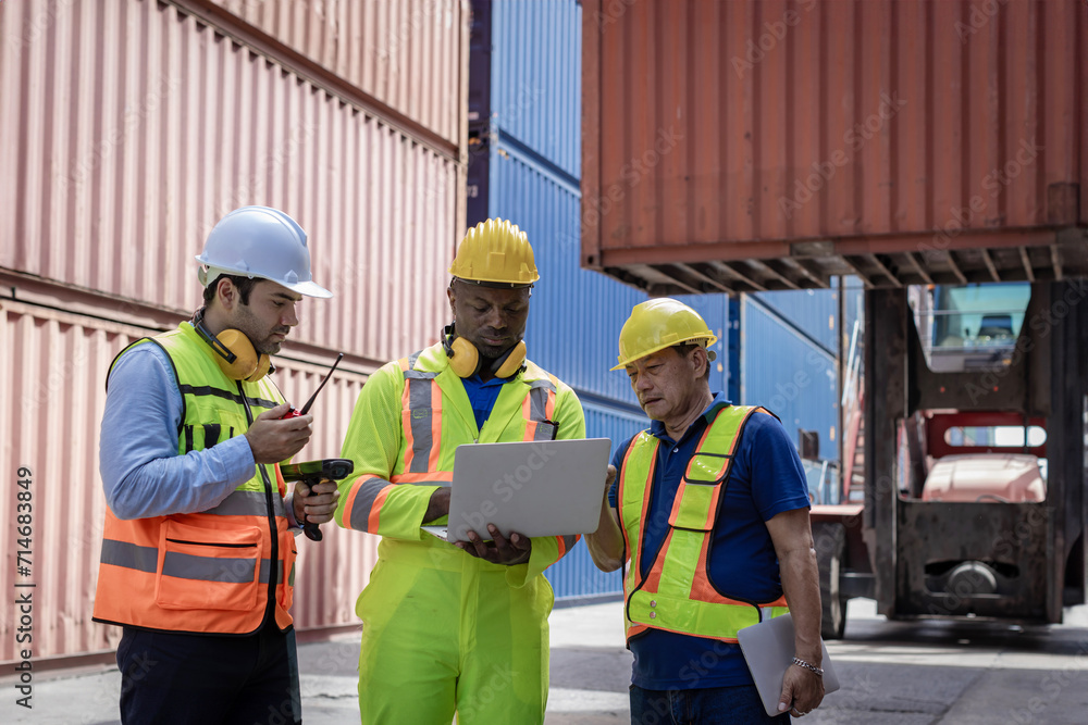 Foreman or worker work at Container cargo site check up goods in container. Foreman or worker checking on shipping containers. Logistics and shipping. Foreman or worker work at Container cargo site check up goods in container. Foreman or worker checking on shipping containers. Logistics and shipping.