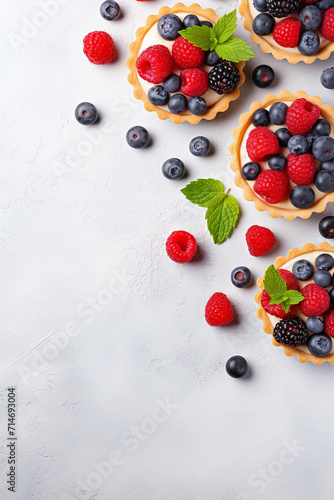 different berries on a white background top view