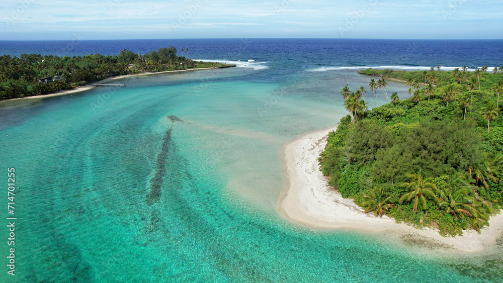 Tropical island coral lagoon beautiful sea view from above. Cook Islands Rarotonga. Cook islands paradise. Beautiful tropical island of Rarotonga view of the blue sea in the lagoon.