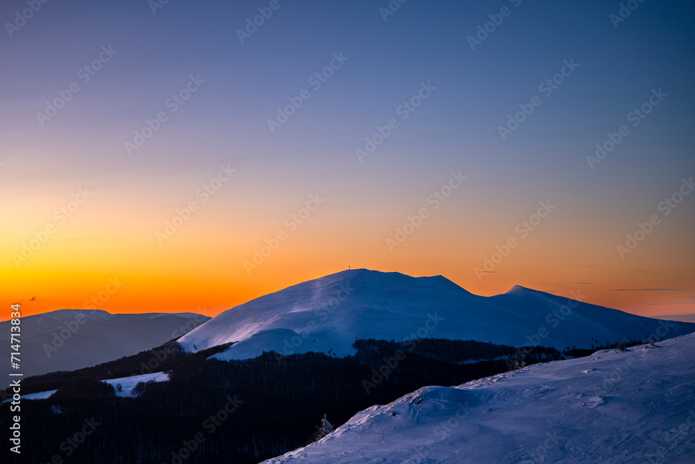 Winter sunset in the mountains. The Mount Tarnica, Bieszczady National Park, Poland.