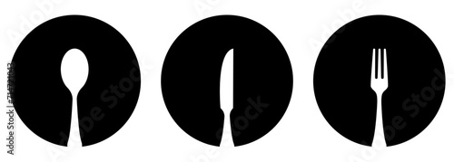 Spoon, fork and knife icons on the plates. Vector illustration photo