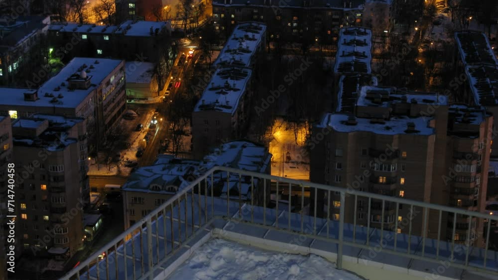 The man on the roof makes the picture night city and then leaves The man on the roof makes the picture night city and then leaves