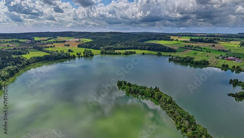 illmensee lake district of sigmaringen in baden-württemberg, germany, 360° aerial turn, 4k, 60 fps, 120 m photo