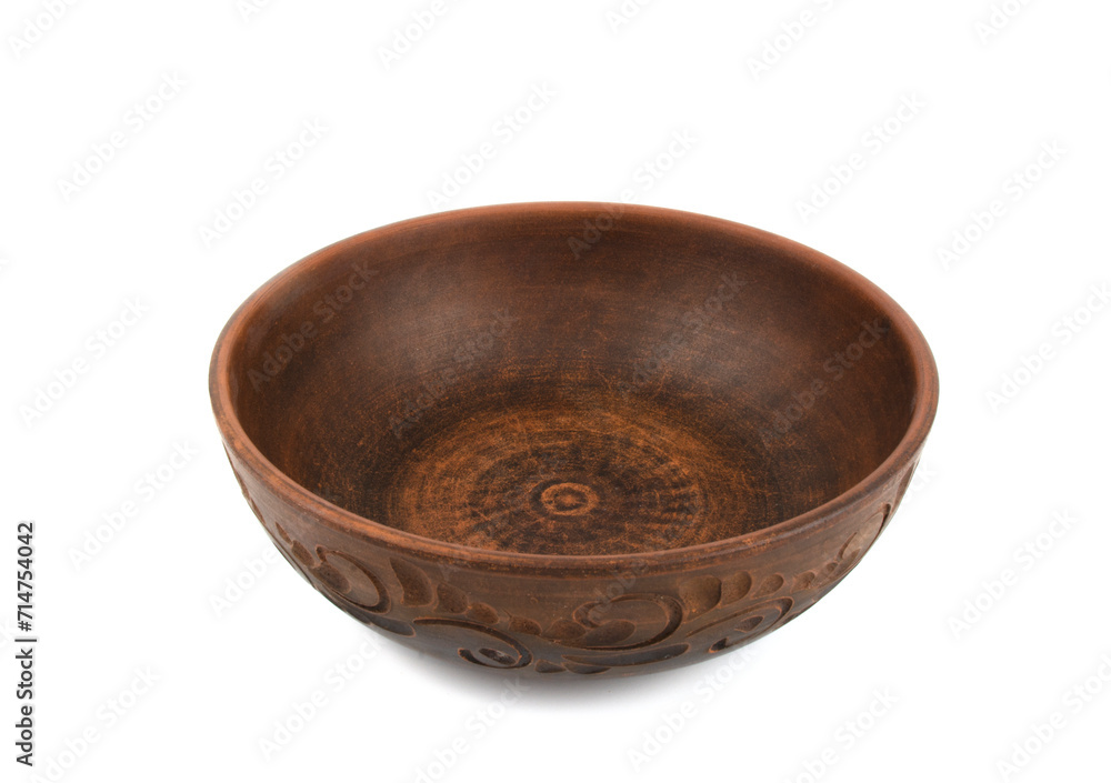 Deep handmade clay plate in close-up, isolated on a white background. Kitchen utensils, dishes for food. Deep handmade clay plate in close-up, isolated on a white background. Kitchen utensils, dishes for food.