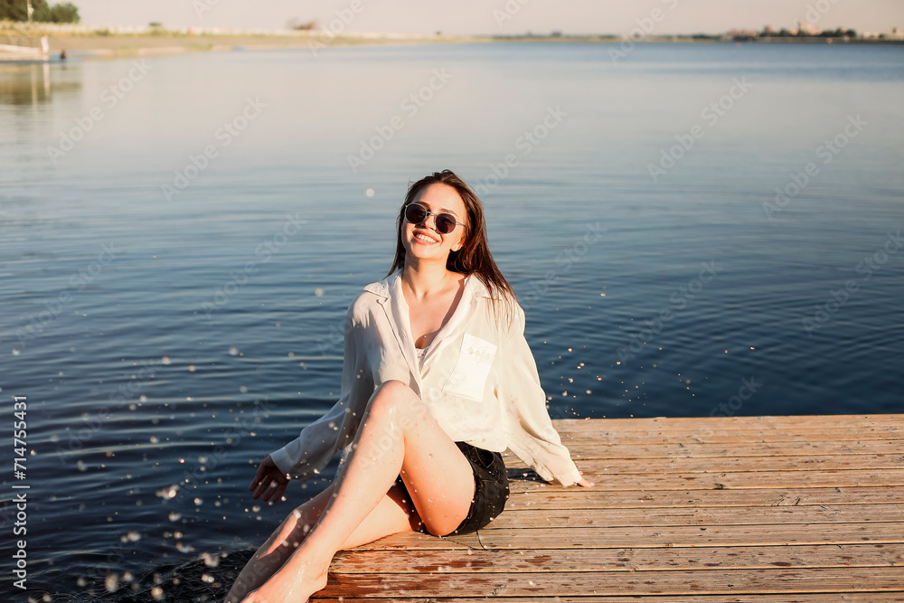 Stylish woman on pier