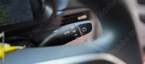 Hand operating switch on the car, car interior button, Interior of the car with cruise control buttons, Hyundai i20: 5 Features stock images photo
