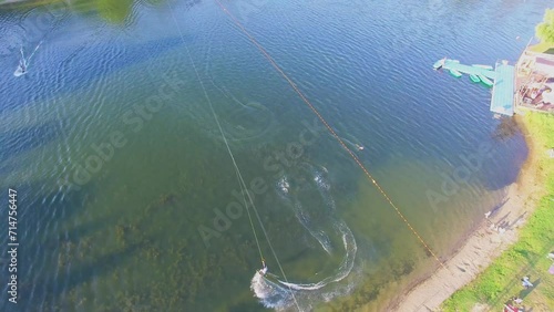 Wake board ride on Putyaevsky pond at spring day  photo