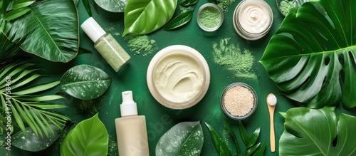 Cruelty-free beauty products made with natural ingredients and no animal testing, showcased with green leaves. photo