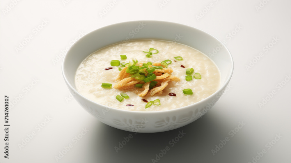 A bowl of comforting chicken congee, a popular dish for suhoor, the pre-dawn meal