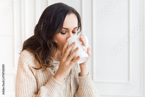 Photography Young pretty woman drinking coffee in the morning