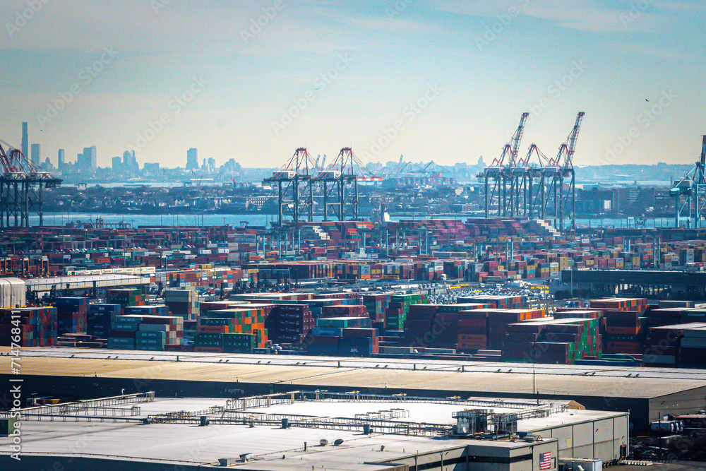 Aerial view of Shipping Containers, Newark Bay, Panamax cranes, and the Port of Newark - Elizabeth Marine Terminal run by the Port Authority of Newark and New Jersey