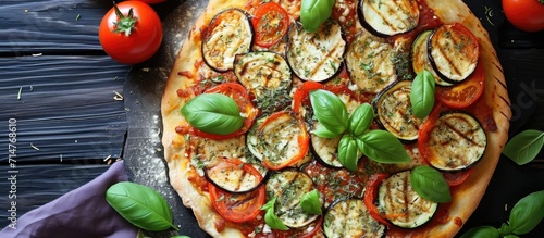 Pizza with grilled zucchini and eggplant, made with nutritious vegetables. photo
