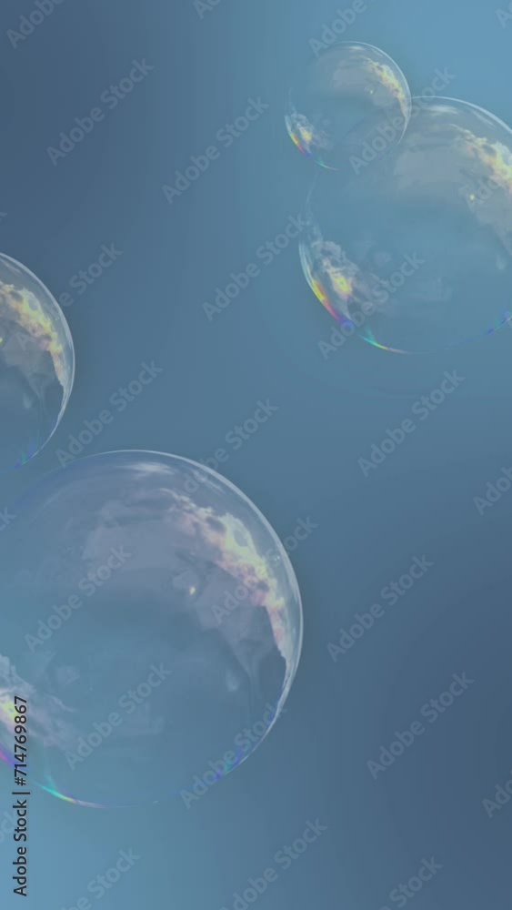 Vertical background video animation with flying soap bubbles on blue ...
