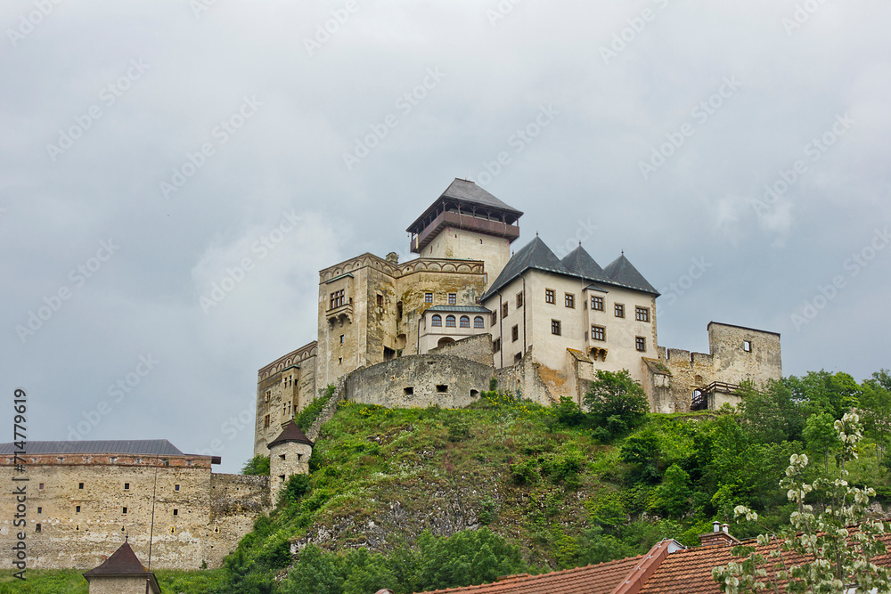 The ancient Trencin Castle from the 11th century in Slovakia. Landscape with a medieval castle on top of a mountain.
