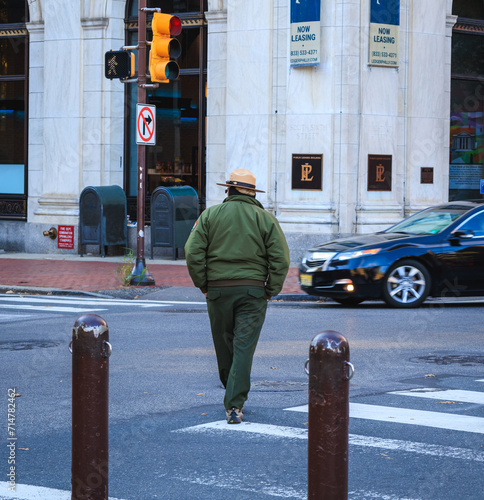 cop walking in the street