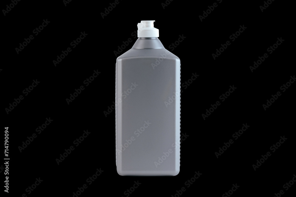 grey plastic bottle on a dark background. grey plastic bottle on a dark background.