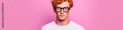 Handsome ginger man isolated on pink background