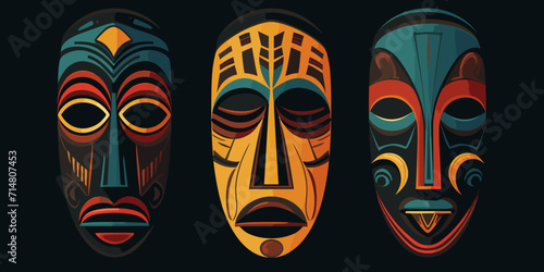 Three african mysterious masks on black background