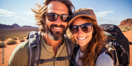 Nature's playground is calling! Join this fantastic couple as they embark on a wonderful backpacking adventure as they travel through breathtaking desert landscapes © Yuri