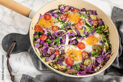 shakshuka with red cabbage, zucchini and celery
