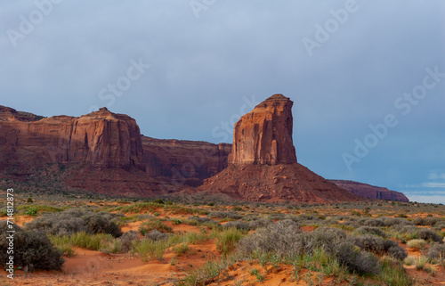 Scenic view to the famous Mittesn Butte and Merrick Butte under beautiful summer sky, Monument Valley