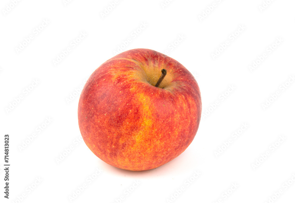 Red apple isolated on a white one. Close-up of the fruit. Red apple isolated on a white one. Close-up of the fruit.