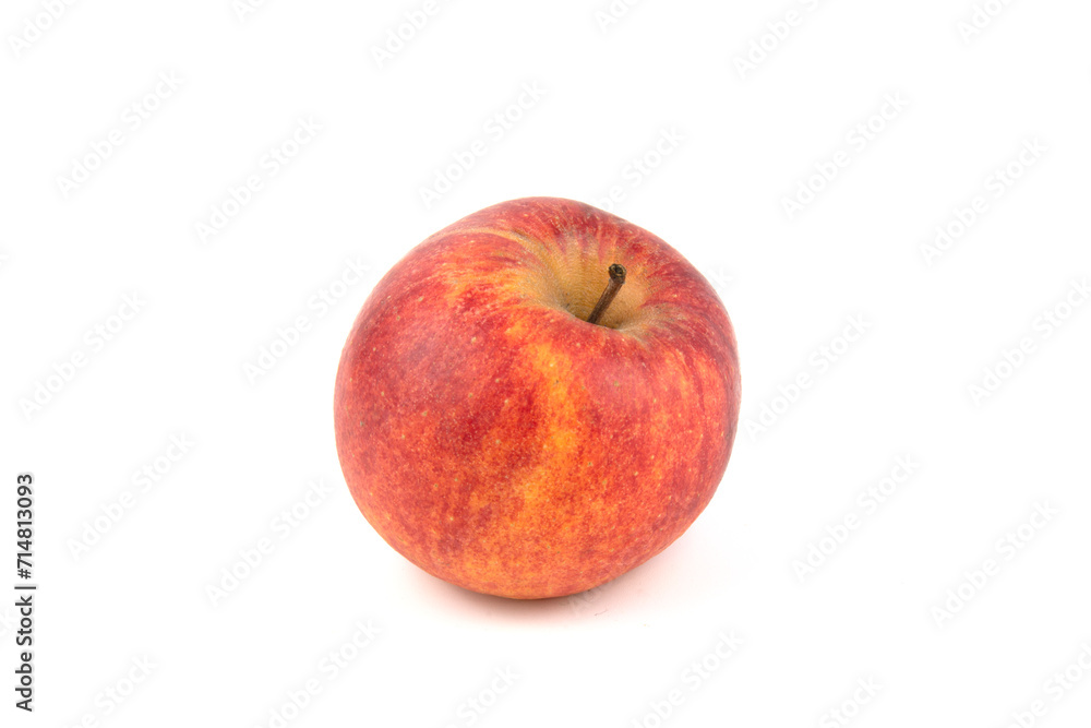 Red apple isolated on a white one. Close-up of the fruit. Red apple isolated on a white one. Close-up of the fruit.