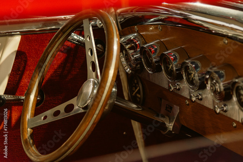 Red hot rod interior with metal gauges